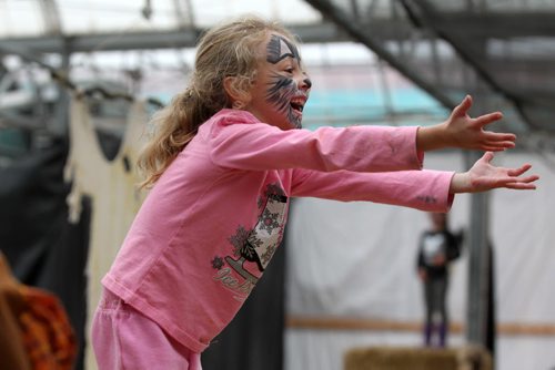 Six-year-old Kaili Marrese rides zip lines and plays in the stacks of hay in the Fun Zone at Shelmerdines open daily till Oct 31/15. Standup photo    Oct 27, 2015 Ruth Bonneville / Winnipeg Free Press