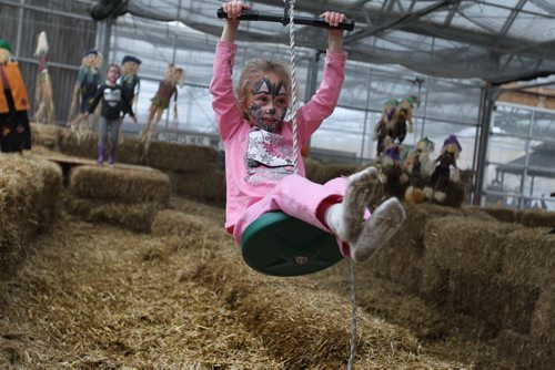 Six-year-old Kaili Marrese rides the zip lines n the Fun Zone at Shelmerdines open daily till Oct 31/15. Standup photo    Oct 27, 2015 Ruth Bonneville / Winnipeg Free Press