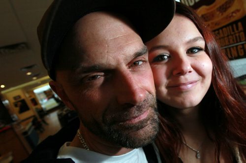 Exhausted after days of hospital bedside vigil, Calli Vanderaa's father Corey poses with Calli's best friend Kailey Compton after she told Gordon Sinclair the story of the shooting that left Calli in hospital fighting for her life. See Gord Sinclair story. October 28, 2015 - (Phil Hossack / Winnipeg Free Press)