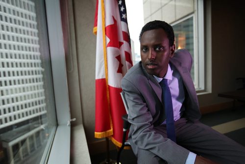 Photo of Hamse Warfa, a guest of the US consulate, here to speak about his experiences as a Somali refugee successfully chasing the American dream.  For Carol Sanders story. Photo taken in the US Consulate office in TD Building.    Oct 28, 2015 Ruth Bonneville / Winnipeg Free Press