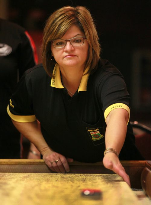 Cynthia Chudyk-Collins delivers at the John Osborne ANAF Legion Wednesday night. The shuffleboarders at the legion hosted the National Championships three weeks ago. See Dave Sanderson's story.  October 28, 2015 - (Phil Hossack / Winnipeg Free Press)
