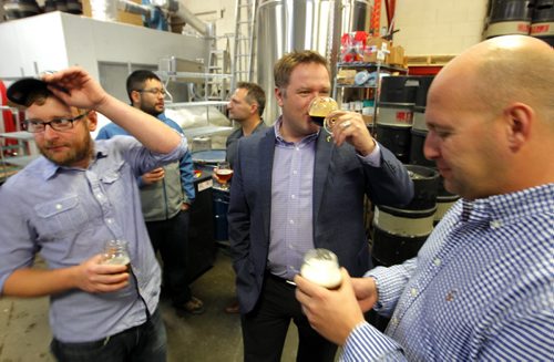 Craft beer makers met today to discuss the future of their business at Half Pints Brewing Company. The group took a break and had a beer in the brewery area. BORIS MINKEVICH / WINNIPEG FREE PRESS  OCT 29, 2015