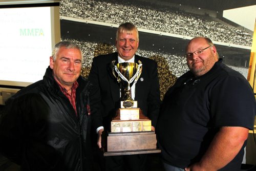 A news conference where details were given about Football Manitoba's Championship Weekend, which takes place Oct. 31 and Nov. 1, 2015 at Investors Group Field. left to right Craig Bachynski, St vital Mustangs head coach, Dale Jacobson, Exec director of Football Manitoba holding the PlayAll Awards Midget Football League of Manitoba championship trophy, and Steve Hoel, coach for Transcona Nationals midget team. The two teams will play this weekend. BORIS MINKEVICH / WINNIPEG FREE PRESS  OCT 29, 2015
