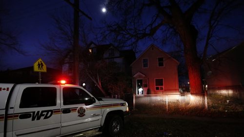 Fire Investigators at a house in the 200 block of Austin Street Friday after an early morning fire. No injuries reported. Wayne Glowacki / Winnipeg Free Press October 30  2015