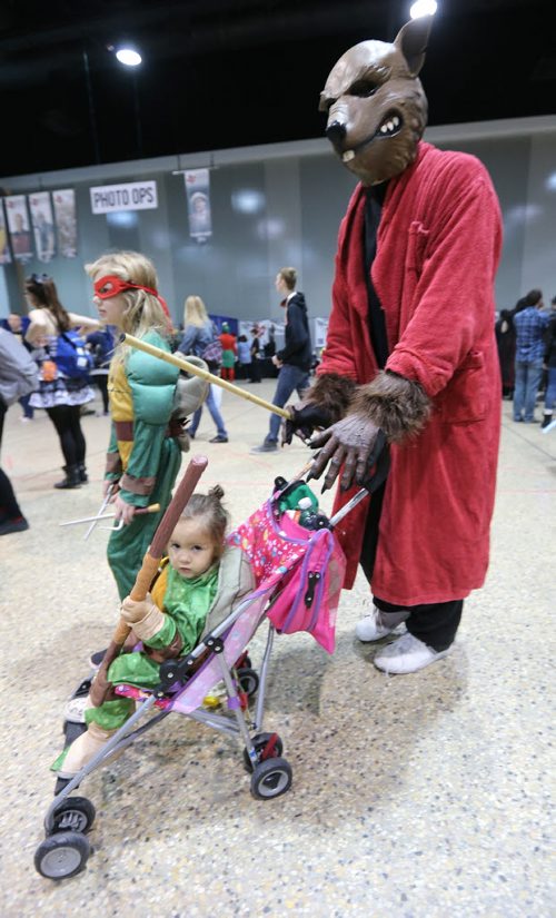 Ryan Starkell as Splinter from Teenage Mutant Ninja Turtles with daughters Aurora, 10, and Ryan, 2, at Central Canada Comic Con at RBC Convention Centre Winnipeg on Oct. 31, 2015. Photo by Jason Halstead/Winnipeg Free Press