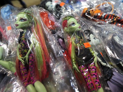 Monster High dolls are lined up on a table at the Cobra Collectibles stall at Central Canada Comic Con at RBC Convention Centre Winnipeg on Oct. 31, 2015. Photo by Jason Halstead/Winnipeg Free Press