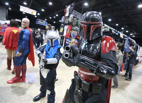 Rush Wenzoski (right) and son Rayden, 12, dressed as Mandalorians from Star Wars at Central Canada Comic Con at RBC Convention Centre Winnipeg on Oct. 31, 2015. Photo by Jason Halstead/Winnipeg Free Press