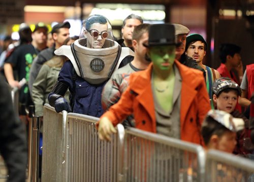 Marco Chenier (dressed Mr. Freeze) and others wait in line to get into Central Canada Comic Con at RBC Convention Centre Winnipeg on Oct. 31, 2015. Photo by Jason Halstead/Winnipeg Free Press