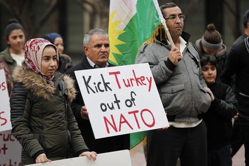 November 1, 2015 - 151101  -  People gather for a rally in support of the reconstruction of Kobane and freedom of Kurdish people from ISIS at City Hall Sunday, November 1, 2015.  John Woods / Winnipeg Free Press
