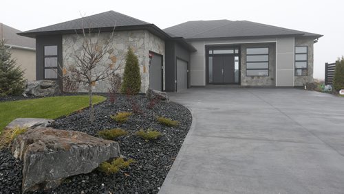 Homes. 37 Big Sky Drive in Oak Bluff West. Artista Homes sales is rep Jennifer Gulay. Wayne Glowacki / Winnipeg Free Press Nov. 2  2015