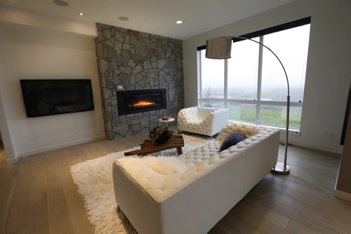Homes. 37 Big Sky Drive in Oak Bluff West. The living room. Artista Homes sales is rep Jennifer Gulay. Wayne Glowacki / Winnipeg Free Press Nov. 2  2015