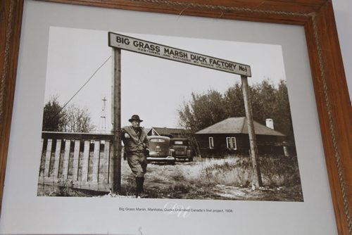 A framed photo commemorating the 1938 restoration of Big Grass Marsh hangs on a wall in cattle rancher Garry Hill's home. He no longer supports Ducks Unlimited. BARTLEY KIVES/WINNIPEG FREE PRESS