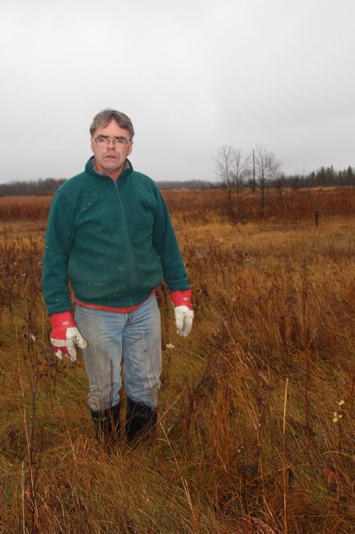 Rancher Garry Hill on his land near Big Grass Marsh. He's now down to 60 head of cattle and can no longer farm grain due to high water levels. BARTLEY KIVES/WINNIPEG FREE PRESS