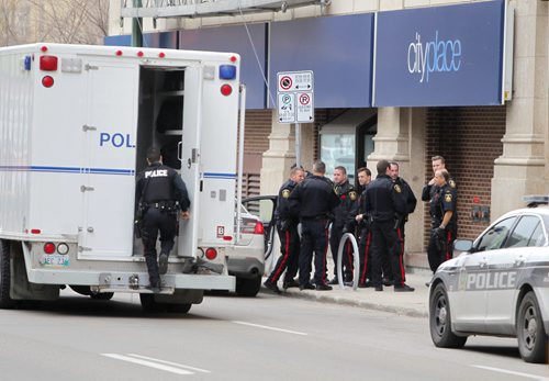 Bomb squad at City Place where a suspicious package was discovered. BORIS MINKEVICH / WINNIPEG FREE PRESS  NOV 2, 2015