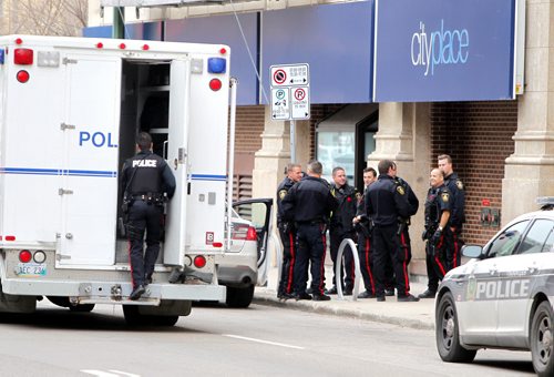 Bomb squad at City Place where a suspicious package was discovered. BORIS MINKEVICH / WINNIPEG FREE PRESS  NOV 2, 2015