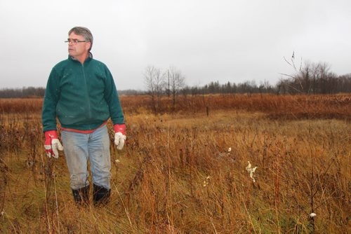 Rancher Garry Hill on his land near Big Grass Marsh. He's now down to 60 head of cattle and can no longer farm grain due to high water levels. BARTLEY KIVES/WINNIPEG FREE PRESS