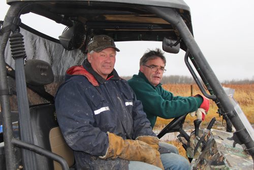 WestLake-Gladstone mayor David Single (left) and rancher Garry Hill in a quad on the latter's ranch, now a marginal operation due to consistent high water on Big Grass Marsh. BARTLEY KIVES/WINNIPEG FREE PRESS