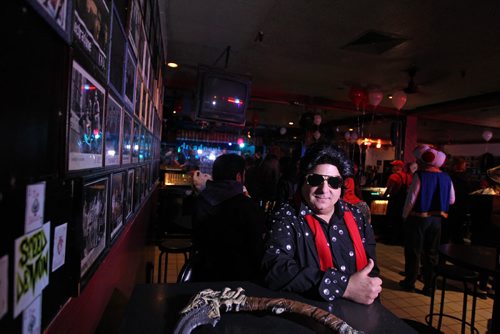 Dave Green with the Osborne Village Zoo wears a Elvis costume for Halloween on its last night of operation. See story on the closing of the longstanding music haven in the village    Oct 31, 2015 Ruth Bonneville / Winnipeg Free Press