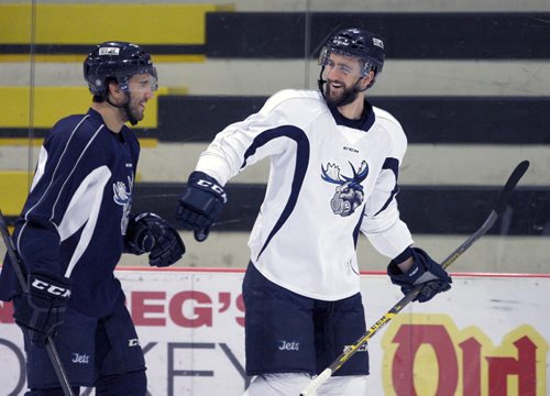 Manitoba Moose Patrice Cormier, left, and Julian Melchiori at practice Tuesday morning at MTS Iceplex -See story Nov 03, 2015   (JOE BRYKSA / WINNIPEG FREE PRESS)