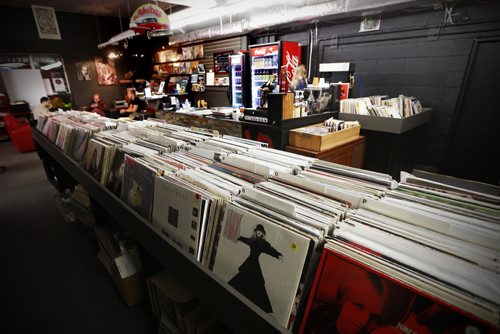 November 3, 2015 - 151103 - Inside Vinyl Revival Tuesday, November 3, 2015. Darren Sawchuk, a defense lawyer by day who, a few weeks ago, opened Vinyl Revival, a used record store, school, cafe, and open stage in the old Tredwell's Music Store.  John Woods / Winnipeg Free Press