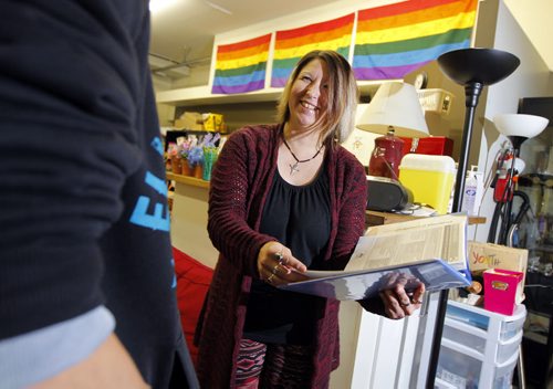 Rainbow Resource Centre - United Way story - Shawn Lagimodiere, left,  chats with youth councillor Dianna Grywinski,right, at the centre. BORIS MINKEVICH / WINNIPEG FREE PRESS  NOV 4, 2015