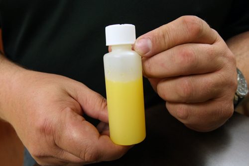 Dr Gerald Hoy holds bottle of Methadone in his Opiate Addiction Treatment Centre at 968 Main St called Oats He is seeing a dramatic increase in the street use of Fentanyl is a powerful synthetic opiate and are using Methadone to reduce withdrawal symptoms -See Larry Kusch story  Nov 05, 2015   (JOE BRYKSA / WINNIPEG FREE PRESS)