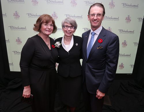 L-R: Ruth Chipman, this year's honouree, Lesley Sacouman, and Steve Chipman at the St. Paul's High School Ignatian Challenge Award Tribute Dinner on Nov. 3 at the RBC Convention Centre Winnipeg. Photo by Jason Halstead/Winnipeg Free Press