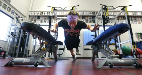 Fitness. Free Press reporter Geoff Kirbyson does depth pushups at Aspire. The exercise begins with his hands on the floor and he quickly pushes up and places his hands on the benches along side.    Geoff Kirbyson first person story. Wayne Glowacki / Winnipeg Free Press Nov. 6   2015
