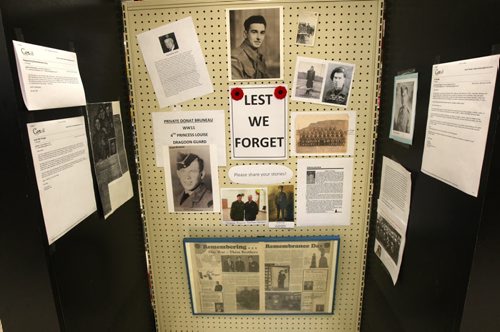 BIGWAY Foods in St. Pierre Jolys, Manitoba- Store decided to not stock their store shelves with Christmas confectionary candies until after Remembrance Day in honour of those who fought in the wars.  Instead, they have a dozen photos placed on these empty shelves of war vets brought in by family and friends from the community.See story Nov 06, 2015   (JOE BRYKSA / WINNIPEG FREE PRESS)