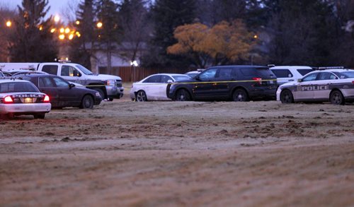 Police were on the scene in the area of Grant Avenue and Kenaston Boulevard Friday evening investigating a police shooting.  BORIS MINKEVICH / WINNIPEG FREE PRESS  NOV 6, 2015