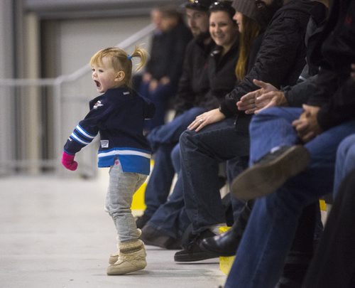 Harlow Boivin, 2, cheers particularly enthusiastically as CN's hockey team challenges Canadiens alumni in a special game at the MTS Iceplex in Winnipeg on Saturday, Nov. 7, 2015.   (Mikaela MacKenzie/Winnipeg Free Press)