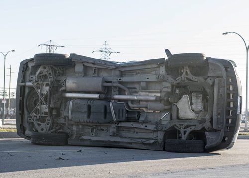 DAVID LIPNOWSKI / WINNIPEG FREE PRESS 151107  A two-vehicle collision that left one on its side is tying up traffic on Taylor Ave at the Walmart parking lot early Saturday November 7, 2015.