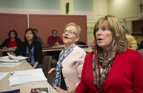 Students sing in a choir class at St. Mary's Cathedral in Winnipeg on Saturday, Nov. 7, 2015.   (Mikaela MacKenzie/Winnipeg Free Press)