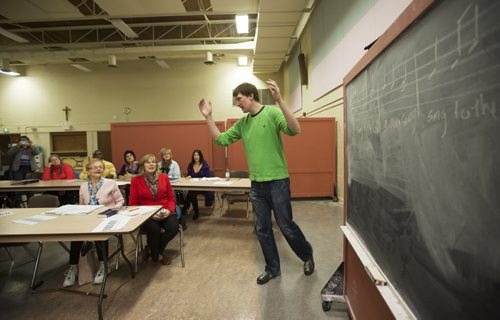 Ian Campbell leads a singing class at St. Mary's Cathedral in Winnipeg on Saturday, Nov. 7, 2015.   (Mikaela MacKenzie/Winnipeg Free Press)