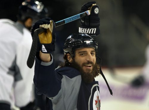 Winnipeg Jets  Chris Torburn stretches at practice today at the MTS Centre in preparation for a 4 game Central Division road trip -See Paul Wiecek and Tim Campbell