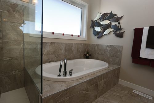 Homes. At left the shower and bath off of the master bedroom at 153 Willow Creek Road in Bridgwater Trails. The  A & S Homes sales rep is Doug Kliewer. Todd Lewys story.  Wayne Glowacki / Winnipeg Free Press Nov. 9   2015