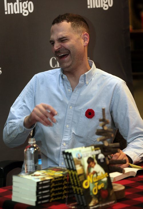 Jay Onrait laughs with fans at Polo Park Chapters Monday. The Fox sportscaster was at the local book store to autograph copies of his second Book. See Geoff Kirbyson story. November9, 2015 - (Phil Hossack / Winnipeg Free Press)