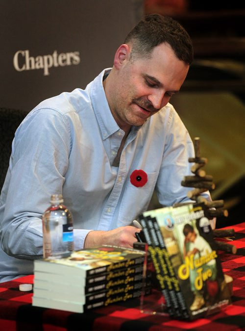 Jay Onrait signs copies of "Number Two" for fans at Polo Park Chapters Monday. The Fox sportscaster was at the local book store to autograph copies of his second book. See Geoff Kirbyson story. November9, 2015 - (Phil Hossack / Winnipeg Free Press)