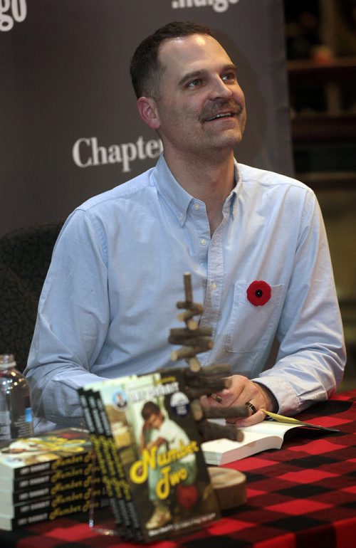 Jay Onrait chats with fans at Polo Park Chapters Monday. The Fox sportscaster was at the local book store to autograph copies of his second Book. See Geoff Kirbyson story. November9, 2015 - (Phil Hossack / Winnipeg Free Press)
