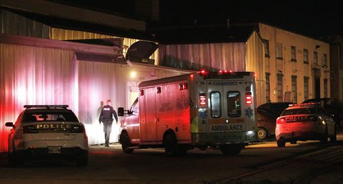 November 9, 2015 - 151109  -  Police investigate a reported shooting in Clearline Self Storage at the corner of Erin and St. Matthews Monday, November 9, 2015.  John Woods / Winnipeg Free Press