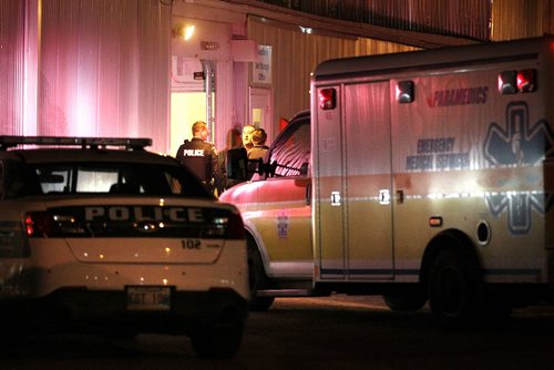 November 9, 2015 - 151109  -  Police investigate a reported shooting in Clearline Self Storage at the corner of Erin and St. Matthews Monday, November 9, 2015.  John Woods / Winnipeg Free Press