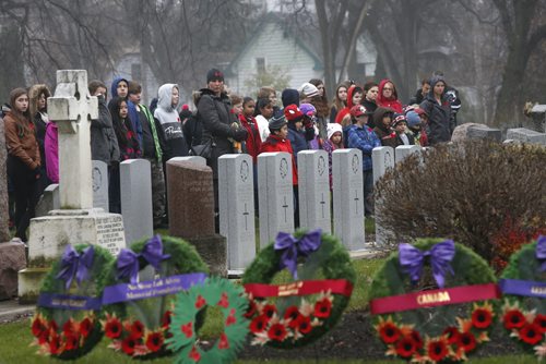 Students and teachers from General Vanier School took part in a Remembrance Day ceremony at the Field of Honour section of the Elmwood Cemetery Tuesday.   Alex Paul story Wayne Glowacki / Winnipeg Free Press Nov. 10  2015