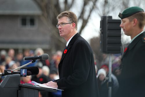 Andrew Swan, MLA Minto, speaks to large crowd gathered at Valour Road Commemorative Plaza at a Remembrance Day Service Wednesday.   Nov 11, 2015 Ruth Bonneville / Winnipeg Free Press