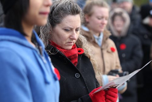 A large crowd surround the monument at Valour Road Commemorative Plaza   during the Remembrance Day Service Wednesday.  Nov 11, 2015 Ruth Bonneville / Winnipeg Free Press
