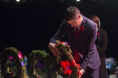 Mayor Brian Bowman places a wreath at the RBC Convention Centre on Remembrance Day in Winnipeg on Wednesday, Nov. 11, 2015.   (Mikaela MacKenzie/Winnipeg Free Press)