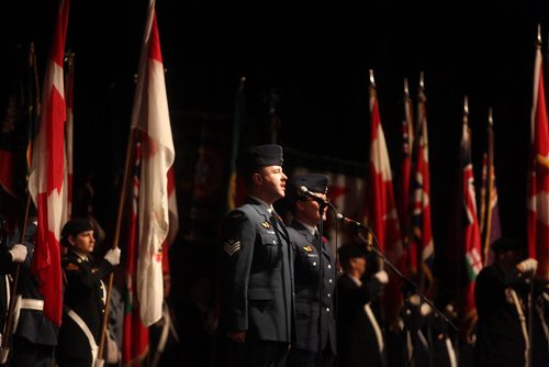 Thousands of people sing O Canada at a Remembrance Day celebration held at the RBC Convention Centre in Winnipeg on Wednesday, Nov. 11, 2015.   (Mikaela MacKenzie/Winnipeg Free Press)