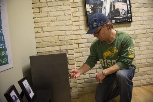 DAVID LIPNOWSKI / WINNIPEG FREE PRESS 151111  Winnipeg Free Press reporter Geoff Kirbyson and son Alex try to make their way out of the Epic Escape on November 11, 2015.  For entertainment story.