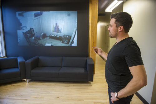 DAVID LIPNOWSKI / WINNIPEG FREE PRESS 151111  Epic Escape Winnipeg Co-owner Wade Gamey checks on Winnipeg Free Press reporter Geoff Kirbyson and son Alex as they try to escape November 11, 2015.  For entertainment story.