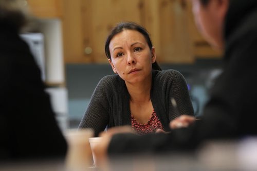 Photos for  Mary Agnes feature piece on CFS, Nelson House First Nation. Charlene Koblishi, councillor with the Wellness Centre, talks and listens intently to a young couple whose children have been apprehended by CFS in a Circle of Care meeting at the Wellness Centre recently. Included at the table is a CFS case worker, surrogates parents (grandparents) as well as family enhancement workers for relationship issues and addictions counselling to assist the parents in getting their kids back and return to their home.   Nov 04, 2015 Ruth Bonneville / Winnipeg Free Press