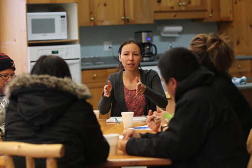 Photos for  Mary Agnes feature piece on CFS, Nelson House First Nation. Charlene Koblishi, councillor with the Wellness Centre, talks and listens intently to a young couple whose children have been apprehended by CFS in a Circle of Care meeting at the Wellness Centre recently. Included at the table is a CFS case worker, surrogates parents (grandparents) as well as family enhancement workers for relationship issues and addictions counselling to assist the parents in getting their kids back and return to their home.   Nov 04, 2015 Ruth Bonneville / Winnipeg Free Press